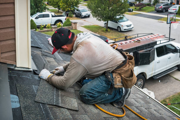 Professional Roofing technician working in Leonard, TX